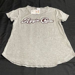 Aggie Chica  Gray; Round neck blouse, short sleeves.